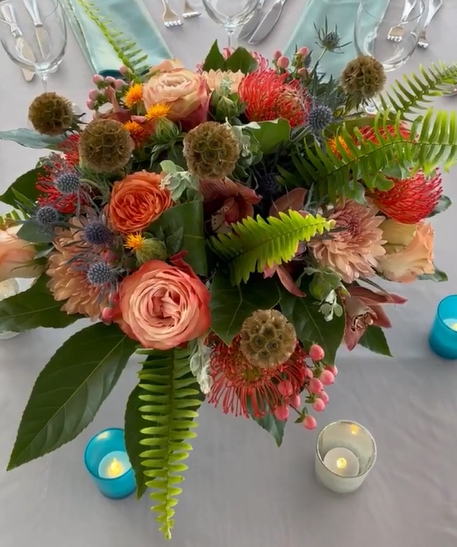 Photograph of custom floral arrangements for New England Aquarium wedding